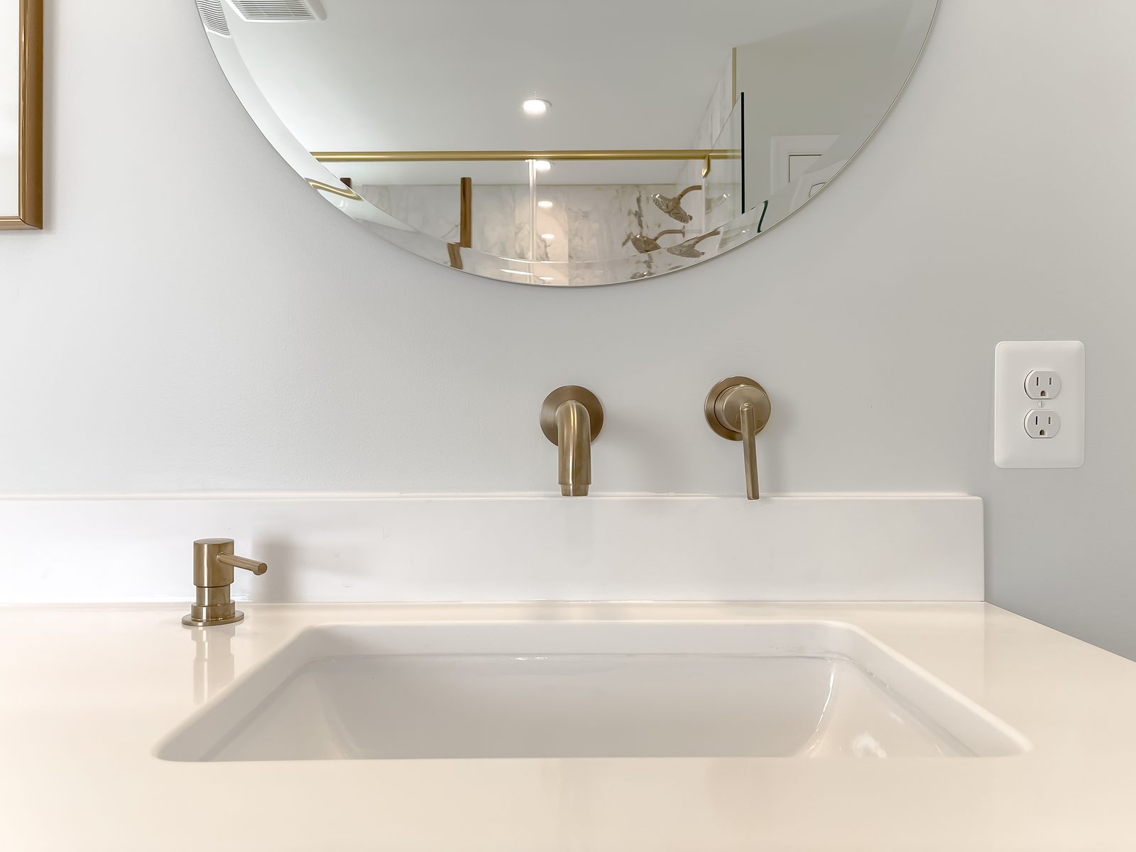 Remodeled vanity in the luxury bathroom remodel by Shady Lane Construction