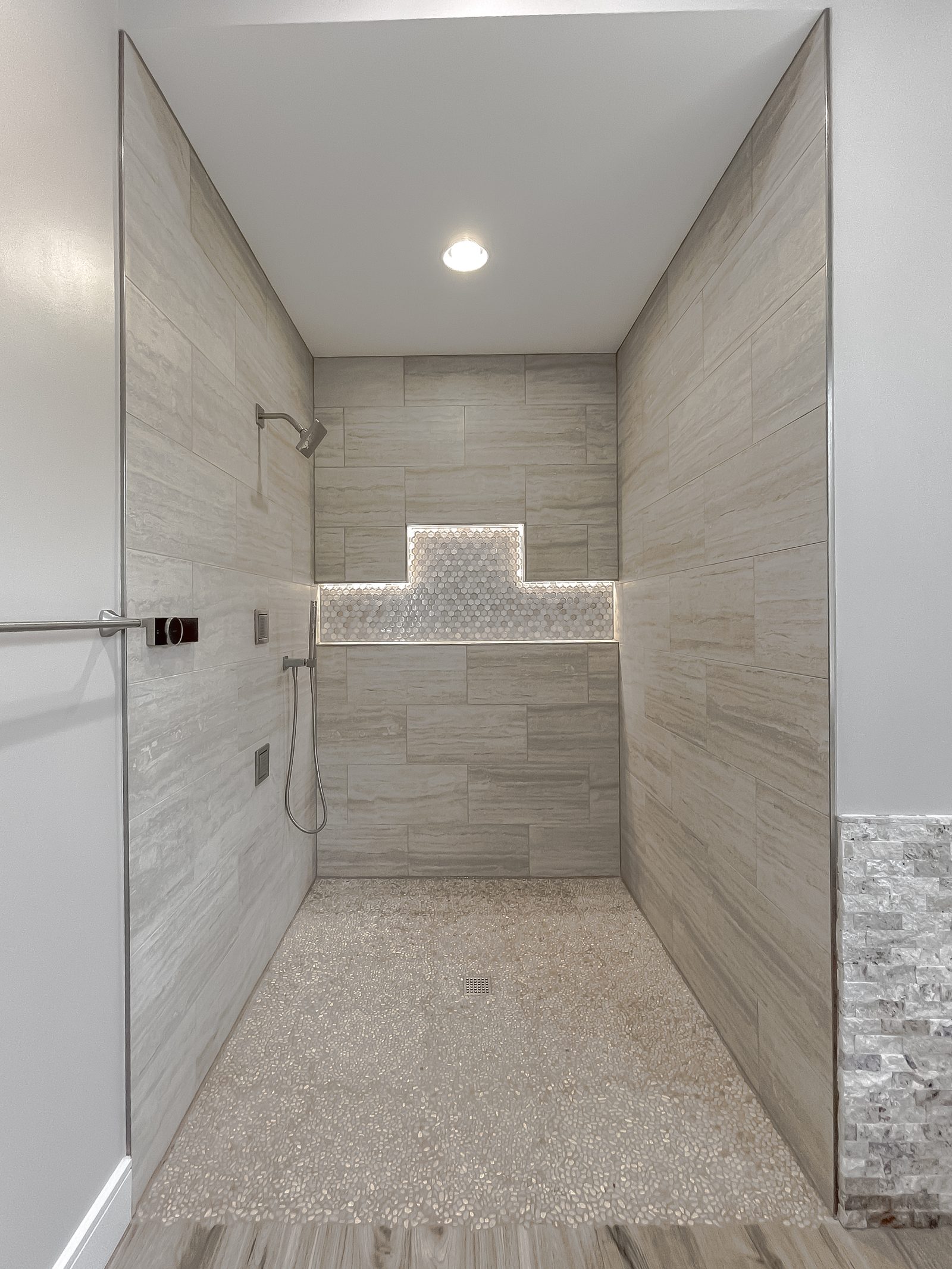 Custom tile shower in the Timber River custom home