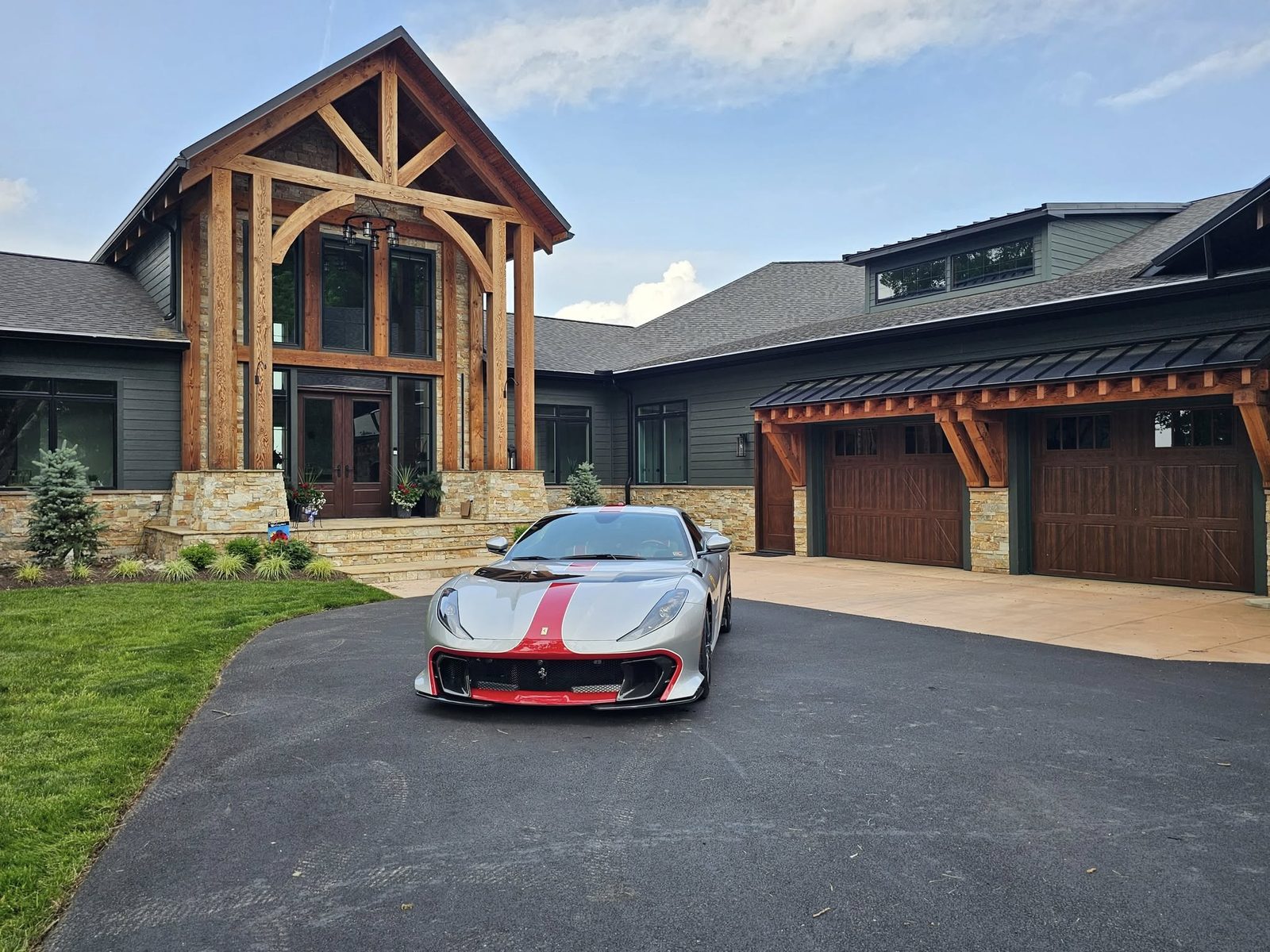 Timber frame entry at the Timber River custom home